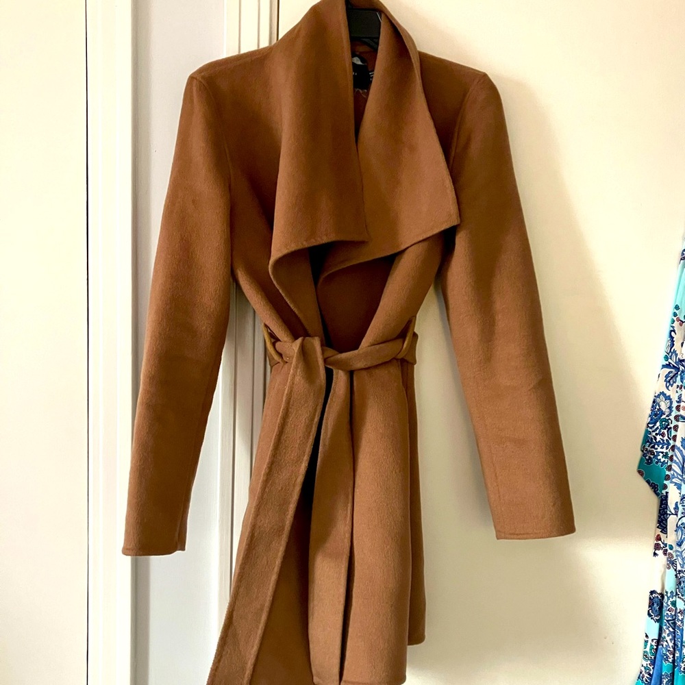 Light weight. Belted. Camel color. No stains.